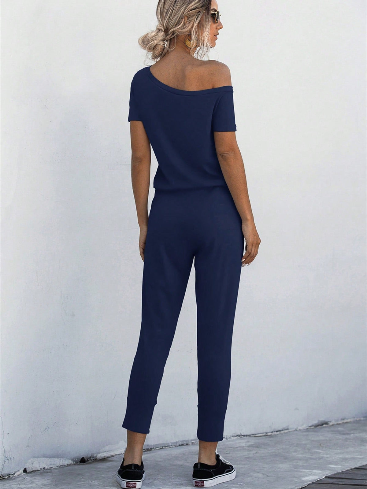 Jumpsuit Maglietta monocolore scollatura asimmetrica con coulisse a vita tasca inclinata