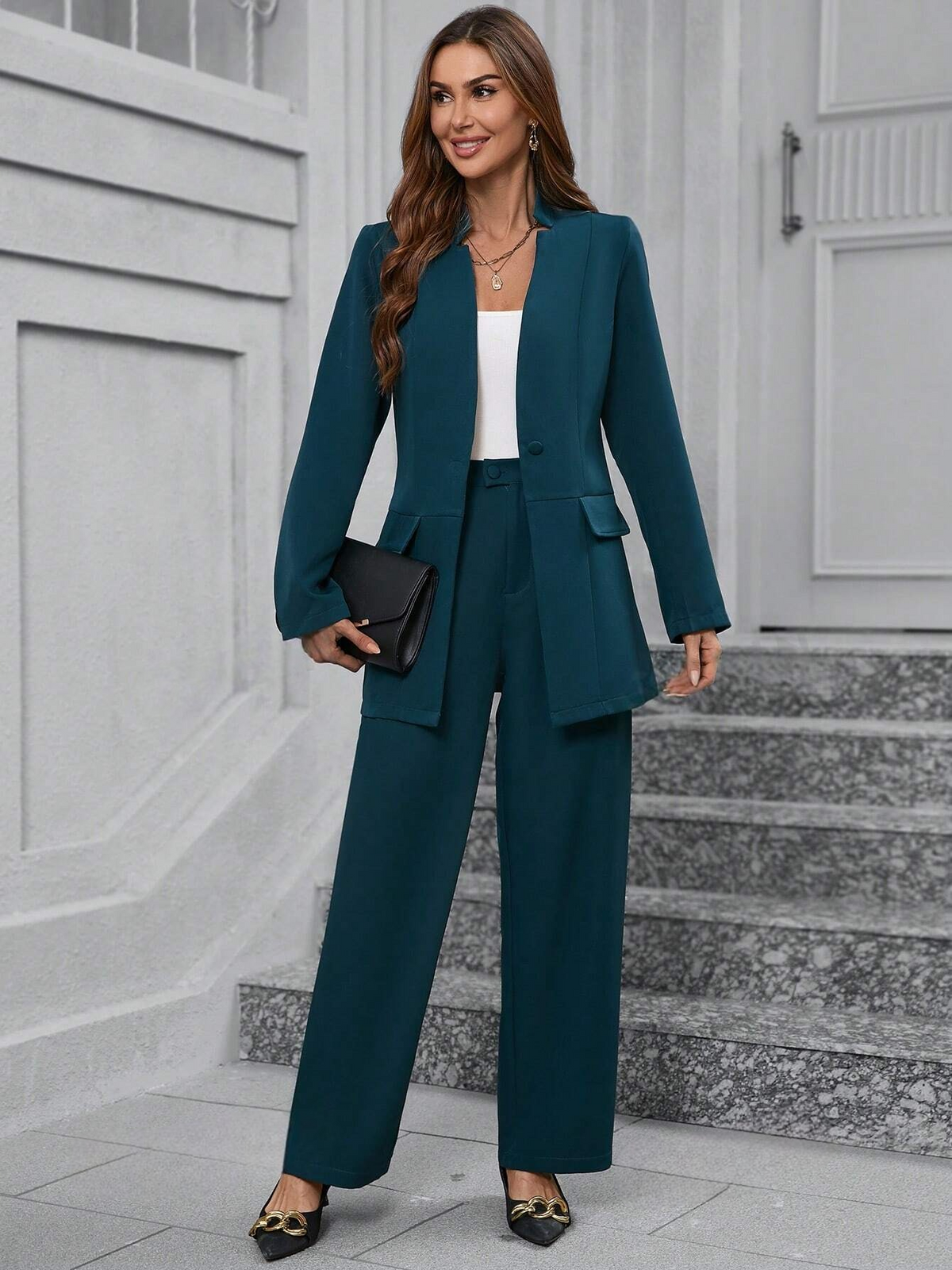 Set elegante da donna composto da blazer a maniche lunghe monocromatico e pantaloni