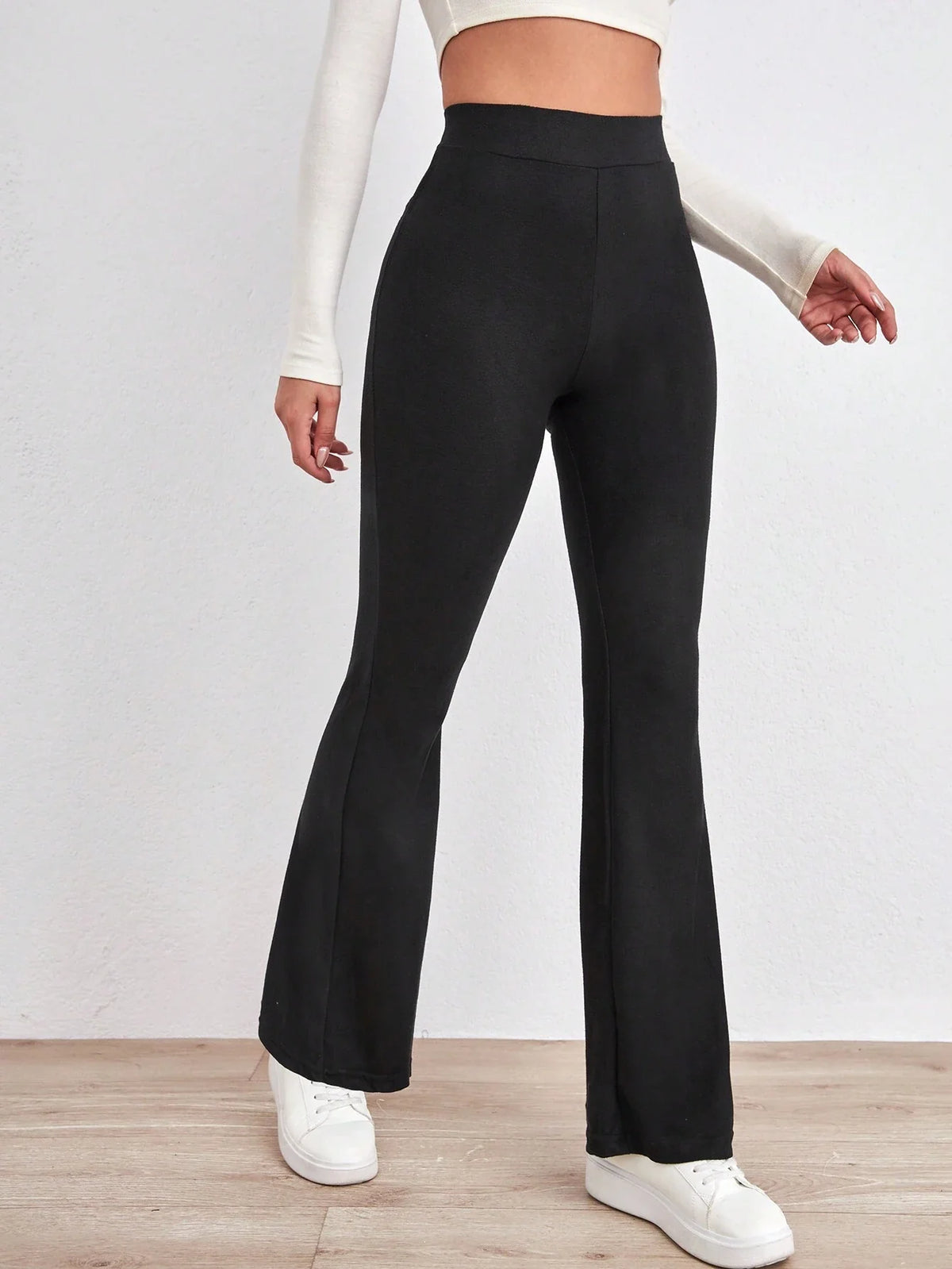 Pantaloni svasati con stampa leopardo