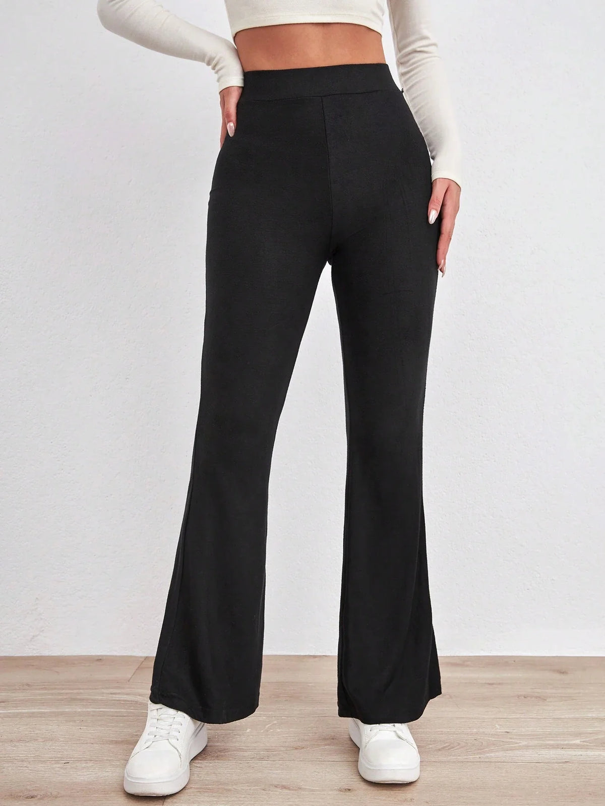 Pantaloni svasati con stampa leopardo