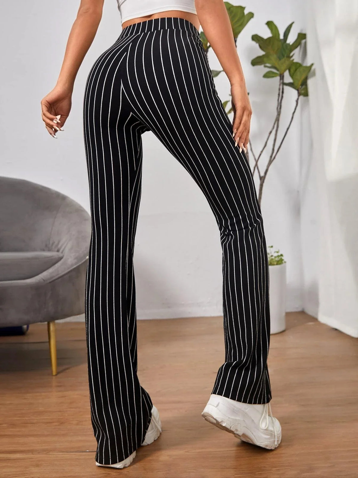 Pantaloni svasati vita alta righe con cintura