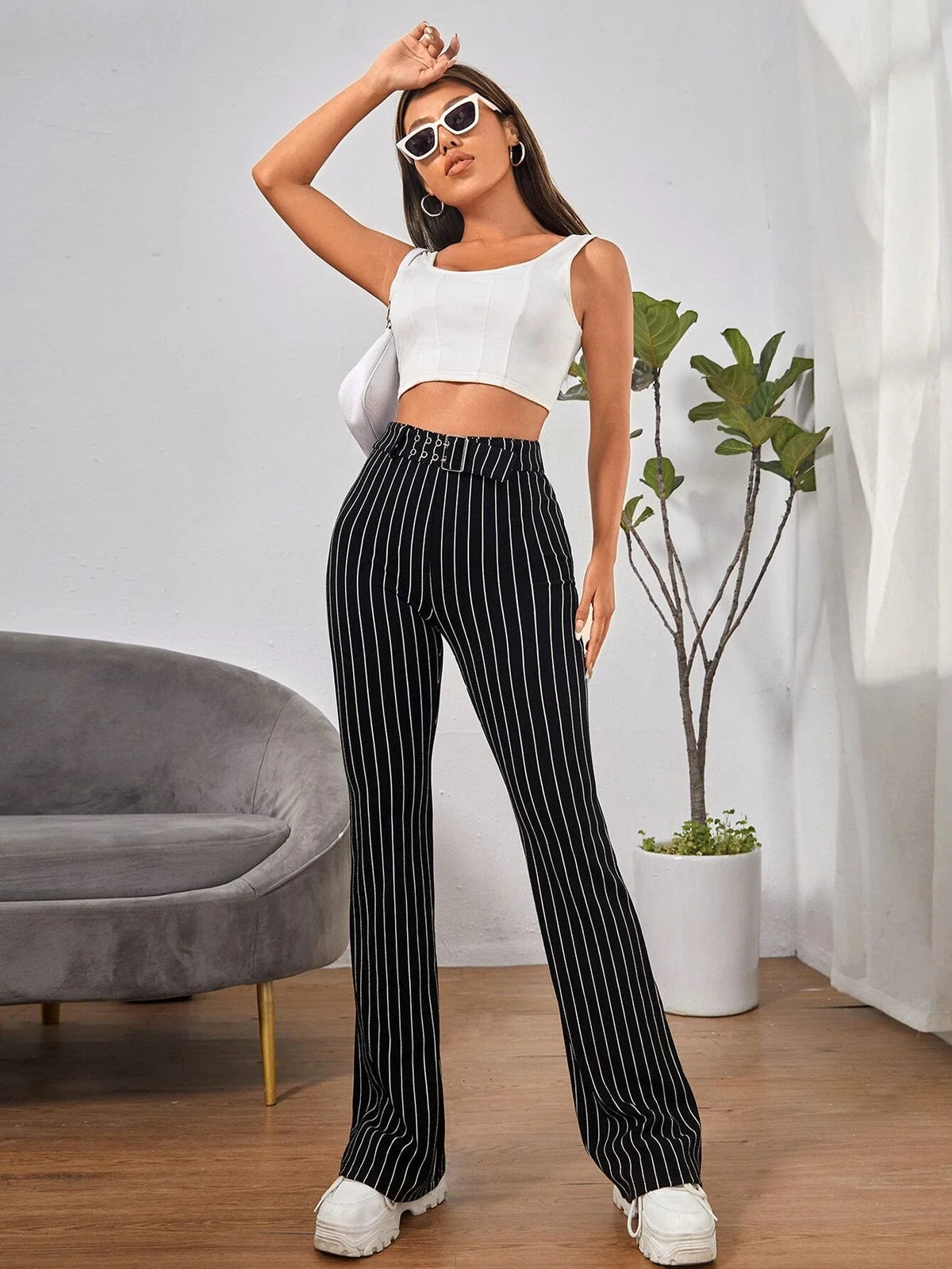 Pantaloni svasati vita alta righe con cintura