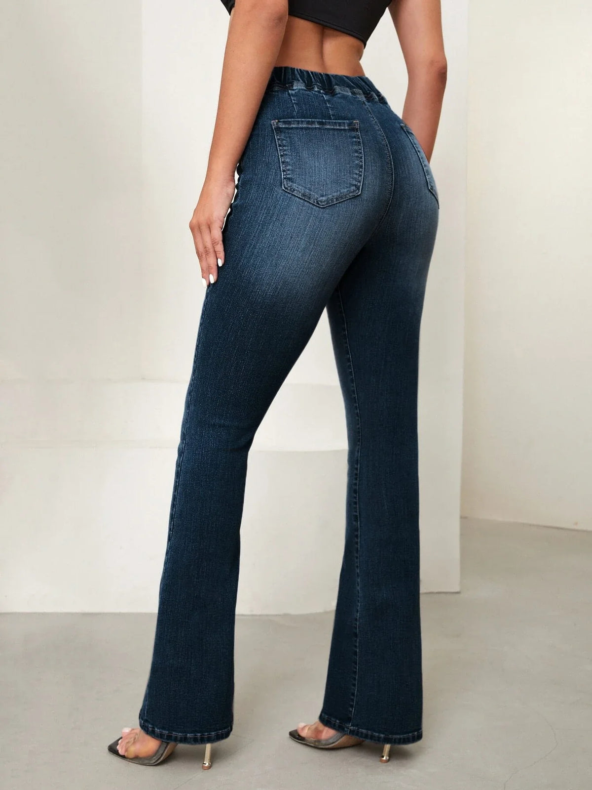 Jeans vita a volant sovrapposti bootcut