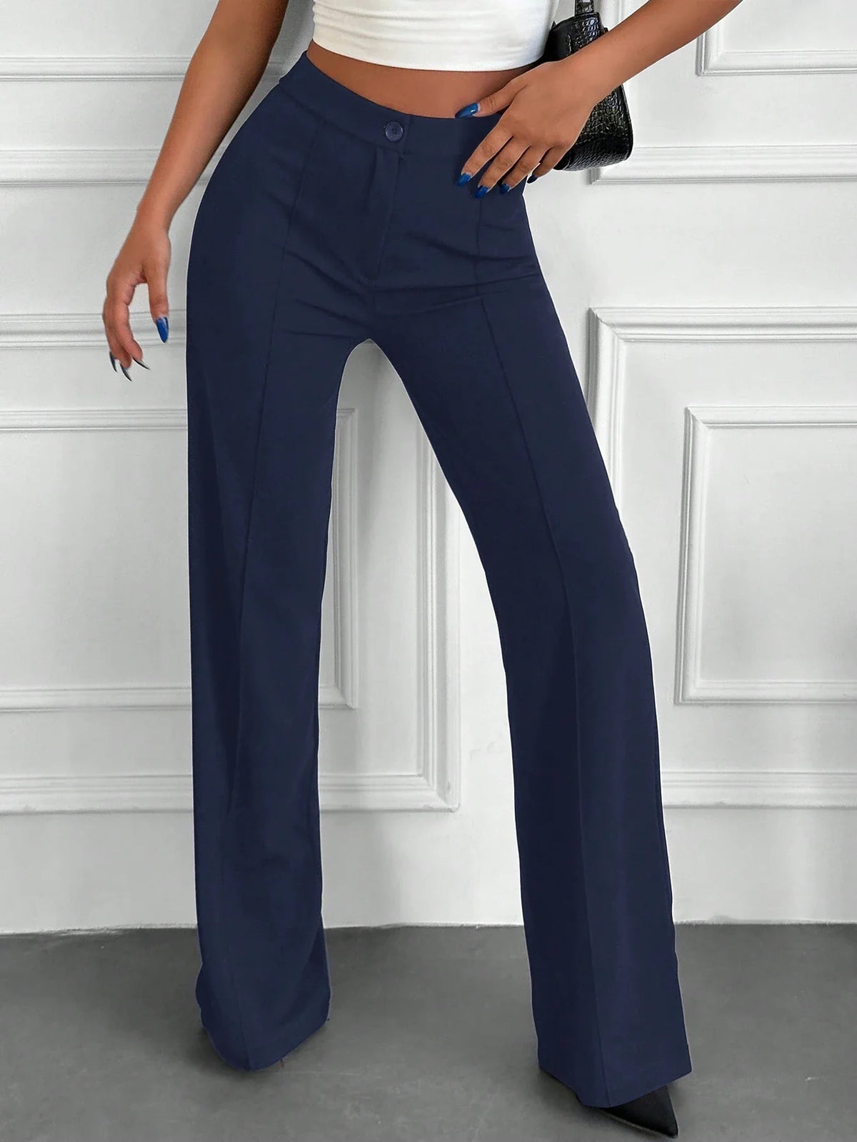 Pantaloni vita alta con bottone frontale